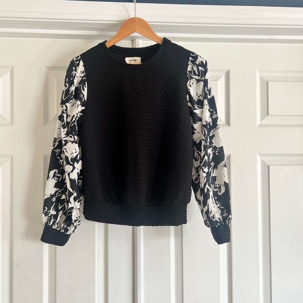 Elegant Black Sweater with Floral Sleeves